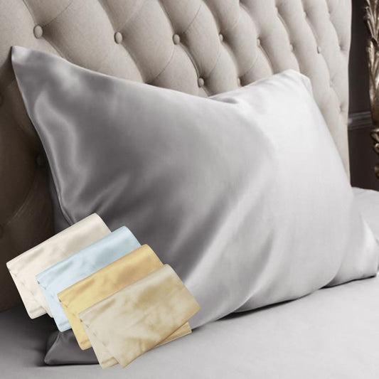 Mulberry silk pillowcase in white on a bed