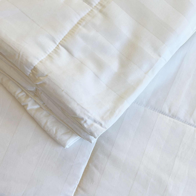 Mulberry silk duvet styled on a made bed