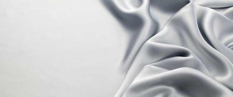 Mulberry silk bedding on a made bed